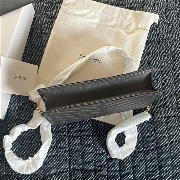 Saint Laurent
Cassandre Envelope Chain Wallet in Lambskin - Picture 10 of 12